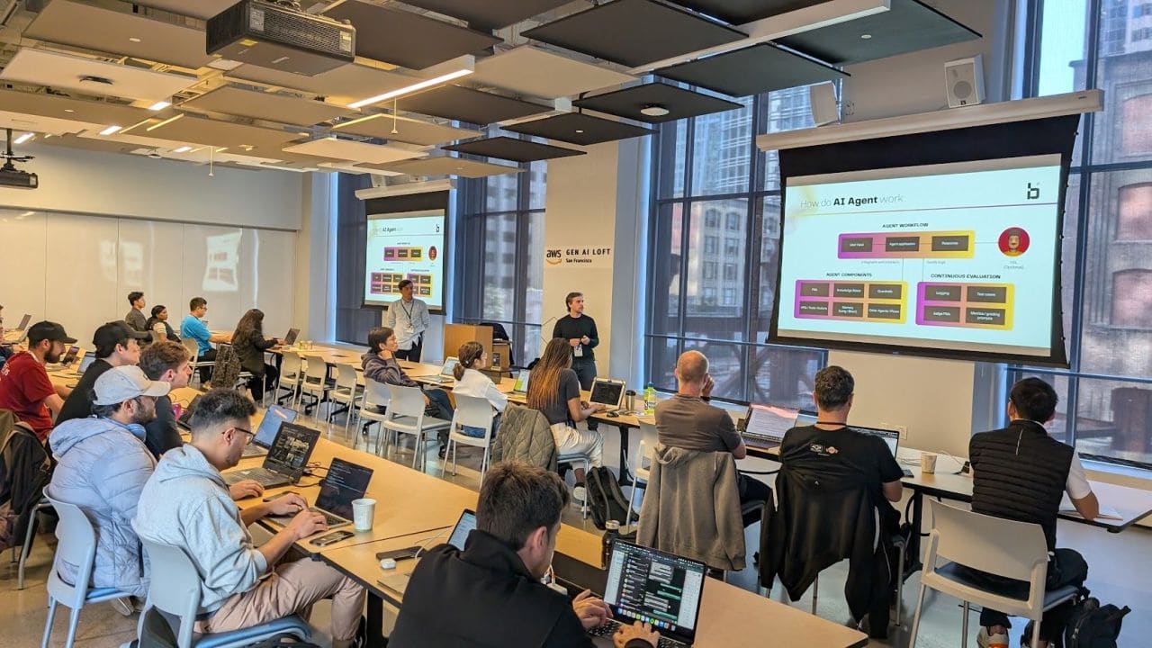 Two binbash speakers walking a full room through a “How do AI Agents work” slide at the AWS Gen AI Loft in San Francisco.
